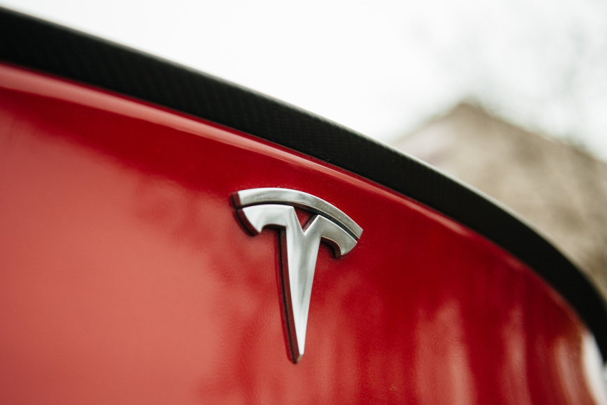 1638050654_7-hdpic-club-p-emblema-tesla-avtomobil-7.jpg